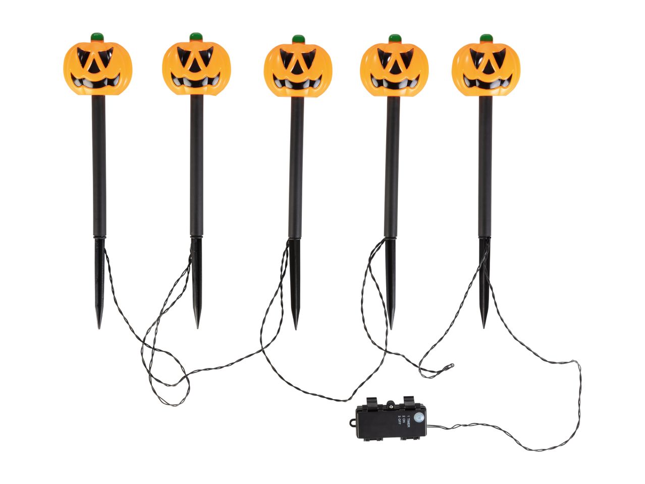 Five Halloween pumpkin pathway lights with black stakes and a control box.