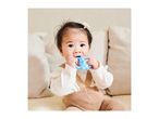 Baby in a white top and brown overalls, chewing on a blue teether.