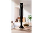 A SilverCrest black hand blender stands on a wooden counter in a kitchen setting.