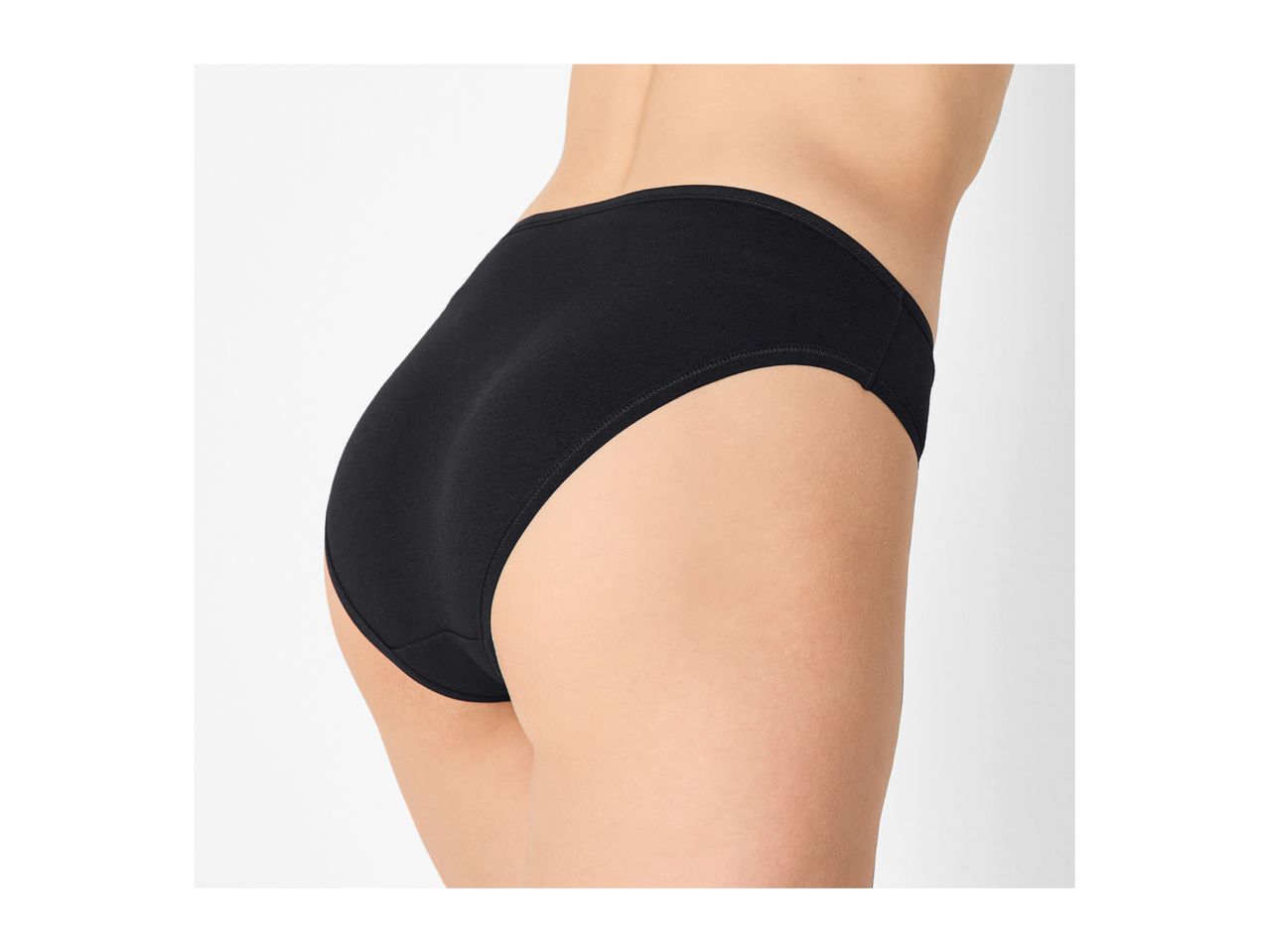 Rear view of a woman wearing black cotton briefs, showcasing the fit and coverage.