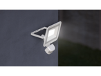 A white LED motion sensor light fixture mounted on a dark gray wall.