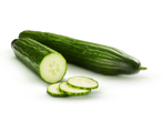 Two fresh cucumbers, one whole and one sliced, on a white background.