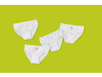 Lupilu® kids' briefs with heart patterns on a green background.