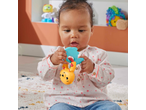 Fisher-Price baby holding a yellow and blue Rattle, sitting on a patterned rug.