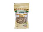 A clear plastic bag of sunflower seeds with nutritional information and a vegan logo.