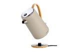 SILVERCREST® KITCHEN TOOLS Kettle, beige with wooden handle, floating above its base.