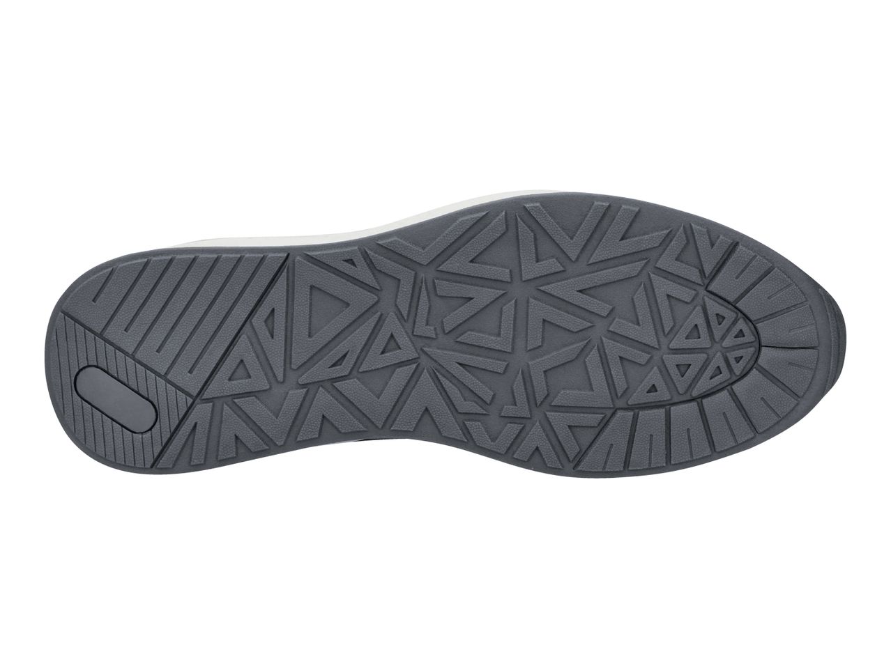 Bottom view of a dark grey shoe sole with a geometric pattern and textured grip.