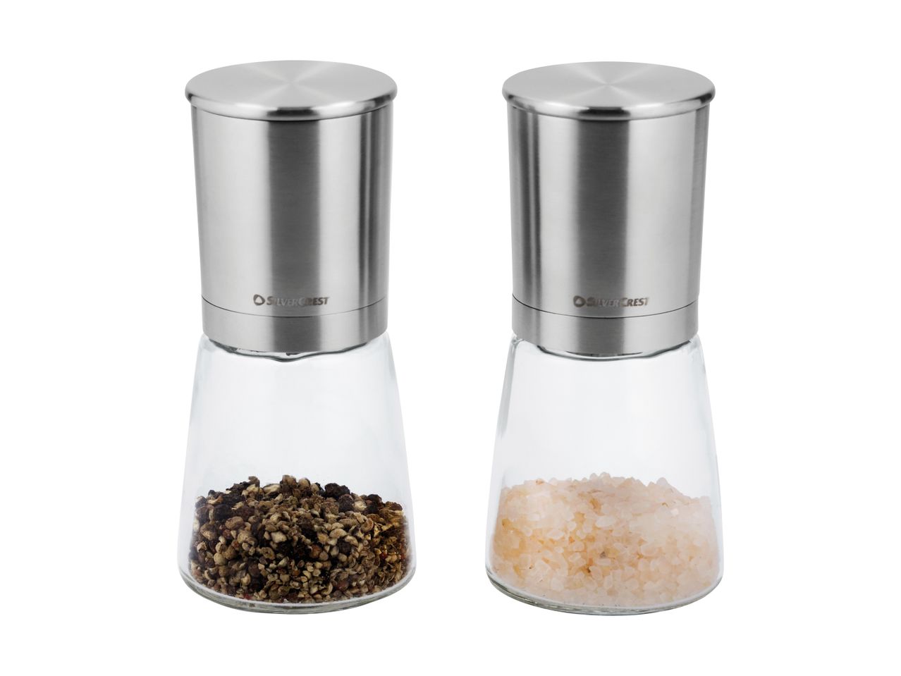 To krydderikværne i rustfrit stål og glas, den ene med peberkorn og den anden med lyserødt salt.