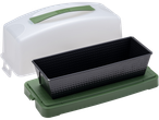 Zenker cake container with a black loaf pan on a green base and clear lid.