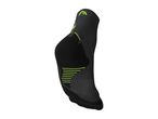 Black and neon green athletic sock with striped patterns.