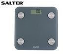 Digital bathroom scale with a grey surface and a display showing '0.0 kg'.