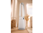White tower fan with a digital display in a bright room with natural light.
