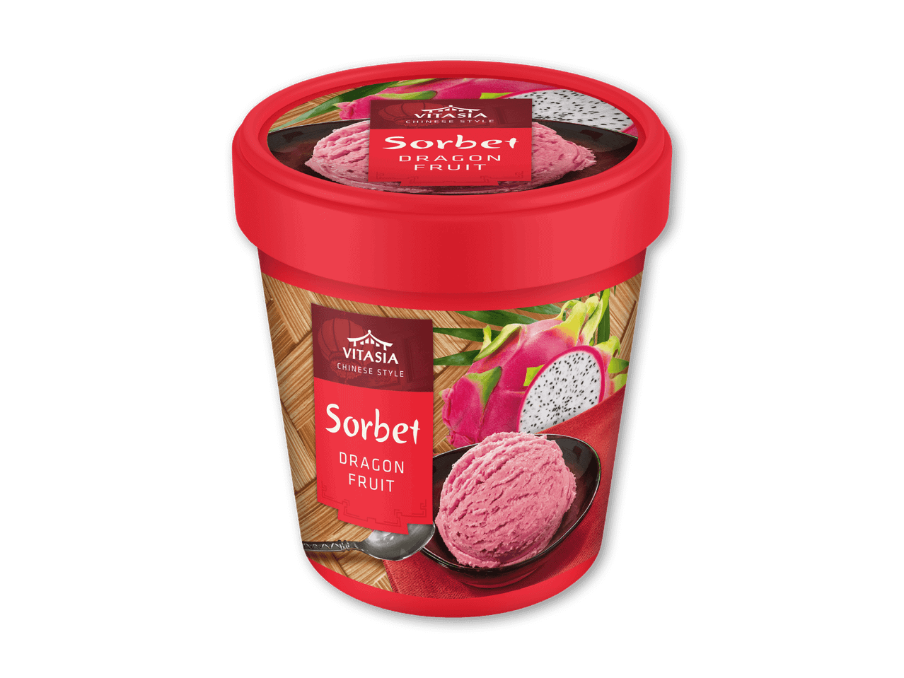Rød beholder med dragefrugtsorbet, en skål med sorbet og en halv dragefrugt.