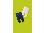 Two pairs of baby trousers, one navy blue and one cream, on a lime green background.