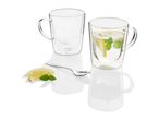 Two double-walled glass mugs, one with a lemon beverage, sit on a reflective surface.