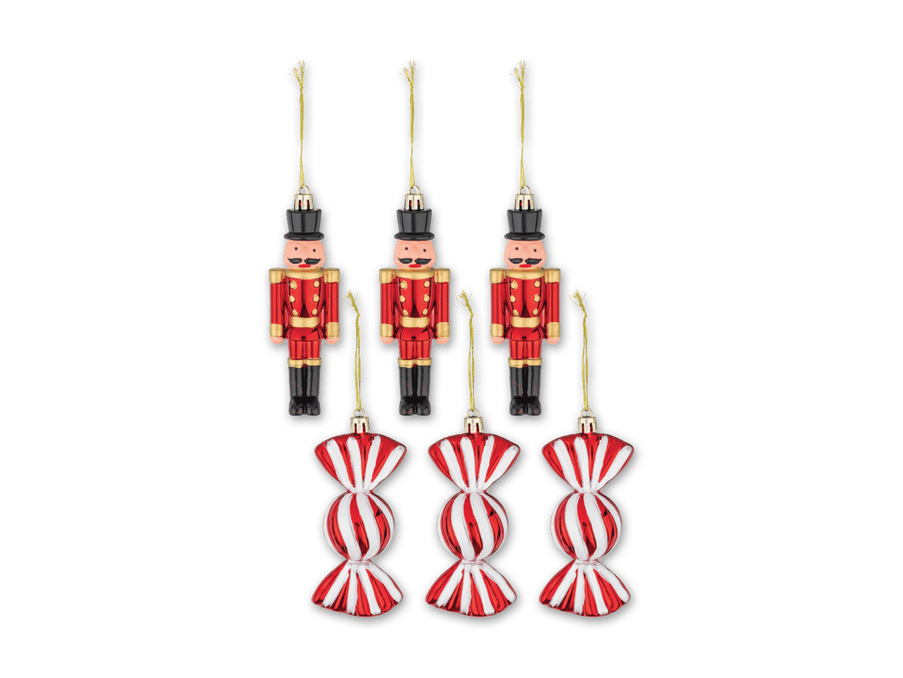 Drei Nussknacker- und drei Bonbon-Weihnachtsbaumschmuckstücke in Rot und Weiß.