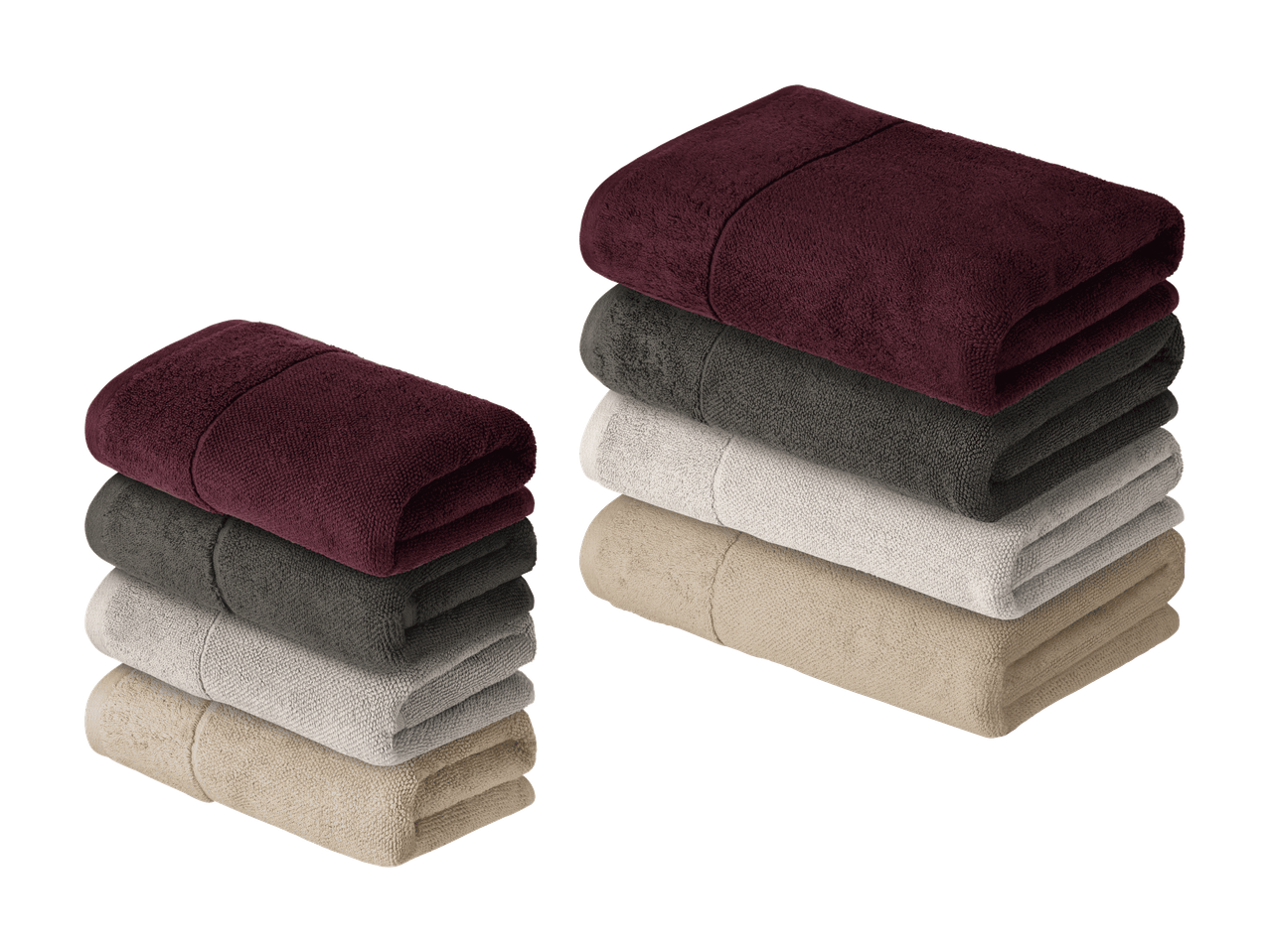 Piles de serviettes pliées bordeaux, grises, blanches et beiges.