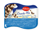 Yoghurt med vaniljesmag og chokoladekugler, med Rainforest Alliance-certificering.