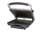 Open electric grill with ribbed cooking plates and a silver and black handle.