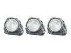 Three outdoor rock-style lights.