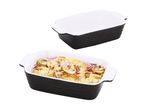 Two rectangular baking dishes, one empty and one filled with roasted potatoes, red onion, and herbs.