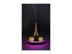 Gold-colored aroma diffuser with purple LED light emitting mist against a dark background