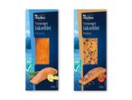 To pakker Nautica varmrøget laksefilet, en klassisk og en med peber, begge med ASC-certificering.