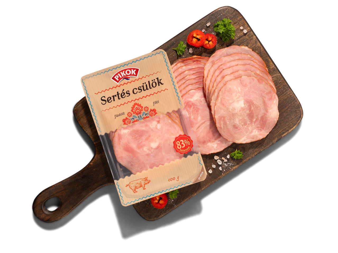 Pikok sertés szeletek fa vágódeszkán.