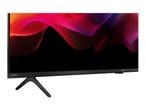 A modern television with a colorful abstract image on the screen, supported by a stand.