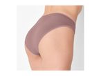 Woman wearing light brown high-waisted briefs, side view