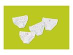 Four pairs of children's briefs, two white with pink hearts, two white with small pink hearts.