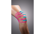 Sensiplast Kinesiology Tape in pink and blue applied to a knee.