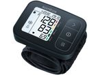 A Sanitas wrist blood pressure monitor displaying a reading of 128/83 mmHg and a pulse of 69 bpm.