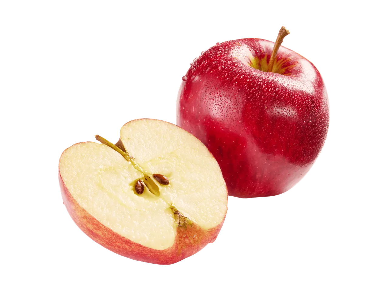 Pommes rouges entières et coupées avec des feuilles vertes.