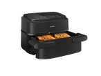 Philips Air Fryer with a drawer pulled out showing cooked chicken inside