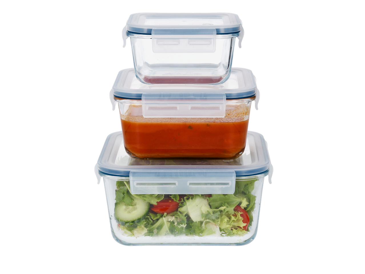 Τρία στοιβαγμένα γυάλινα δοχεία αποθήκευσης τροφίμων Silvercrest® με καπάκια, γεμάτα σαλάτα και σάλτσα.