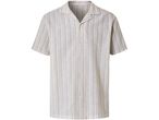 Camicia a maniche corte a righe beige.