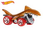 Hot Wheels Sharkruiser toy car, gold with red wheels and a shark-shaped body.