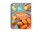Frozen pork and cheese croquettes with a creamy filling, presented on a vibrant, retro-themed box.