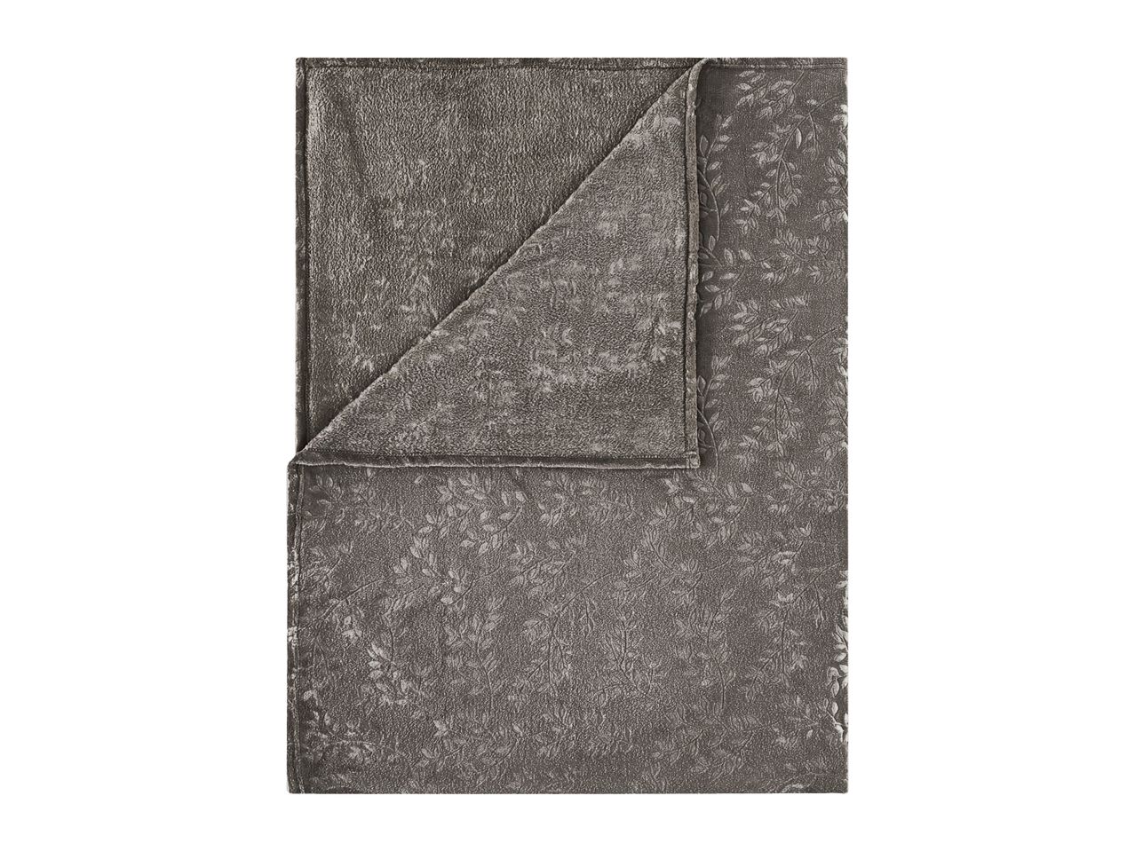 Grey patterned fleece blanket with a folded corner