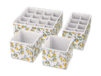 Set mit vier Stoff-Sortierboxen im Zitronenmuster für Schubladen.