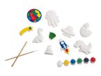 A craft kit with paintable plaster figures, including space and dinosaur themes, paints, and brushes.