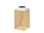 Gold metal solar lantern with decorative cut-out pattern.