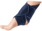 A person's foot and lower leg wearing a dark blue Hot/Cold Compress Set.