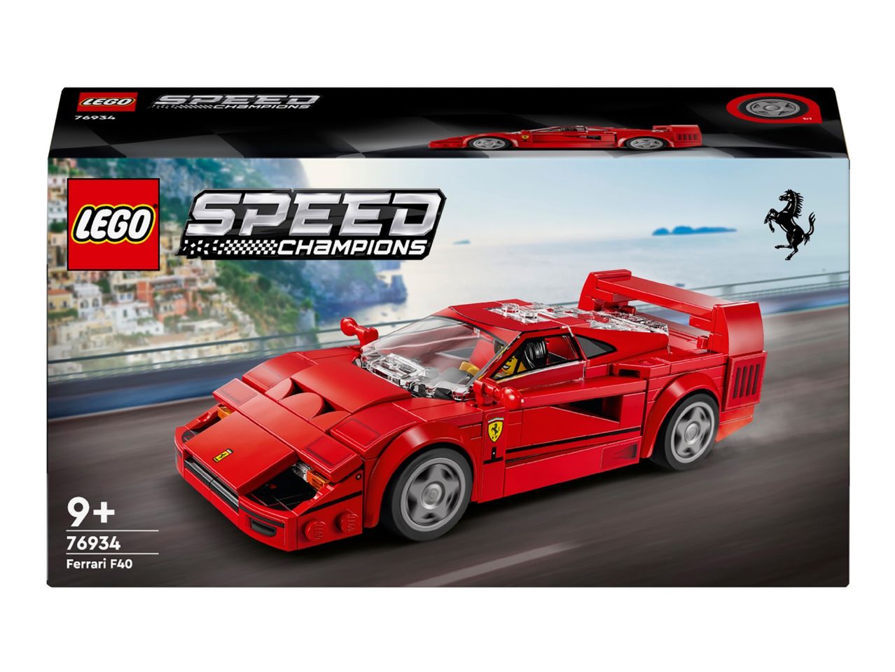 Toy car set box featuring a red sports car on a road with a coastal town background.