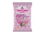 Pink popcorn bag with a beach scene, labeled 'Sweet & Salted' and 'Hand-popped to perfection'.