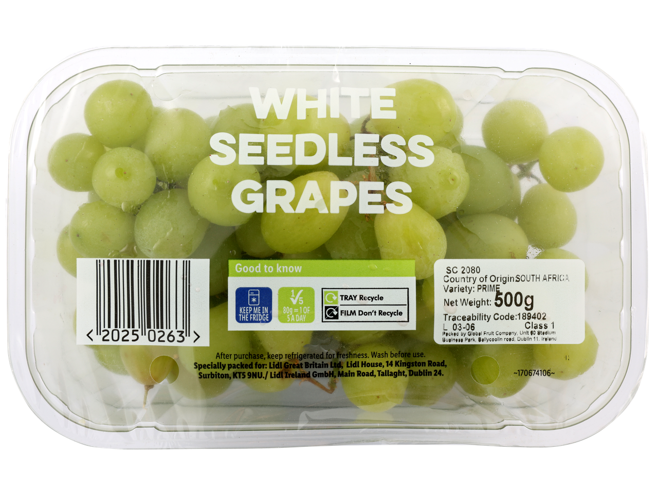 White seedless grapes in a clear plastic container with product information.