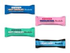 Fire Barebells proteinbarer i forskellige smagsvarianter og farver.