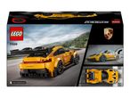 Toy car box featuring a yellow sports car, with close-ups and a top-down view.