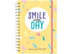 Agenda escolar amarela com a frase 'SMILE every DAY' e elástico rosa.